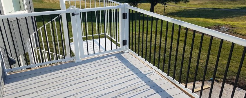 Black Picket Railing with white top and bottom rails by Sprenger Midwest contacting