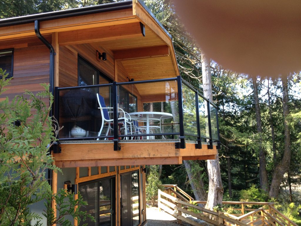 Glass fascia mount deck railings