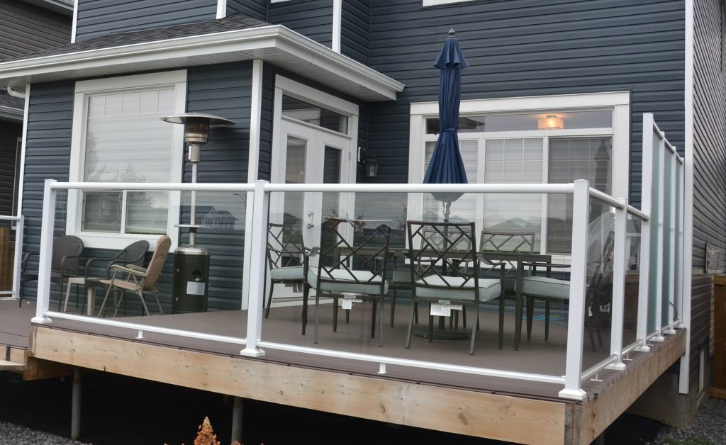 Backyard patio with glass railing system