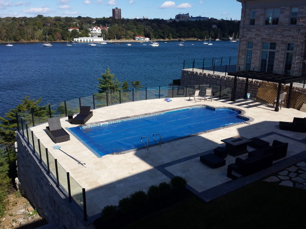 Swimming pool surrounded by Century Aluminum Scenic Railings