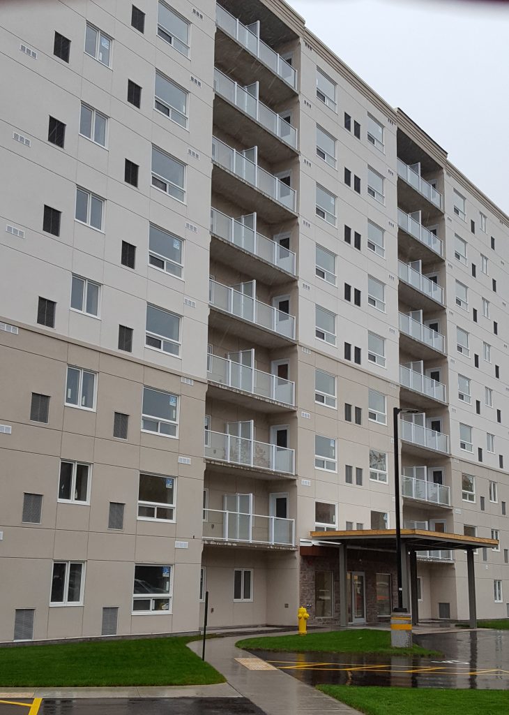 SS Marie commercial complex with glass railings on the balconies