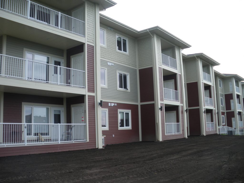 Glass railings installed on the decks of an apartment building