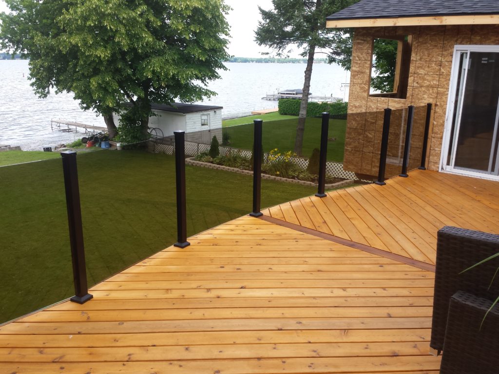 Black tinted glass railing system by Century