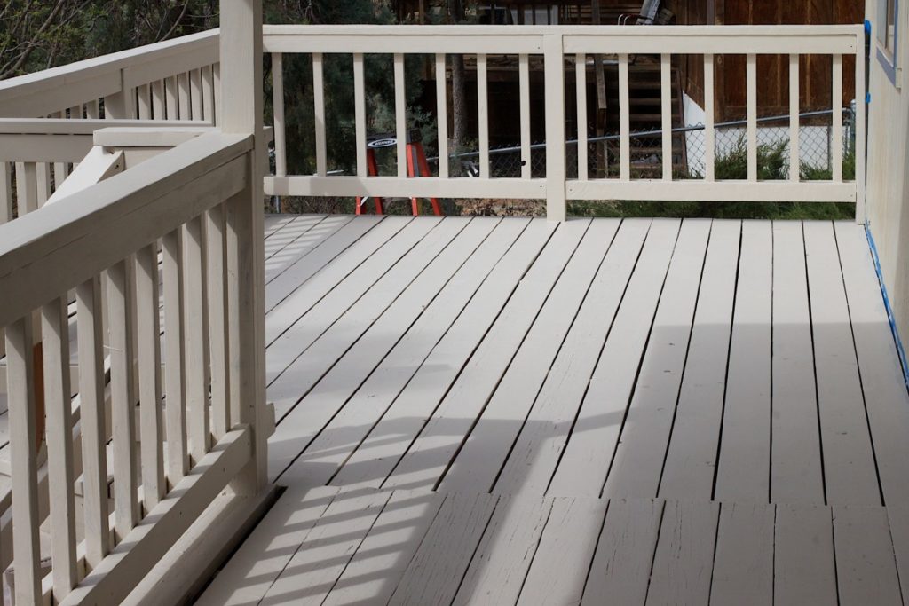 deck with wooden railings