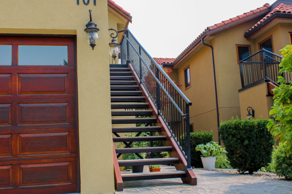 Staircase with Century Pipe Railing System and pipe railing item with required parts attached. This railing installation up to date with building code requirements and ready for inspection / review.