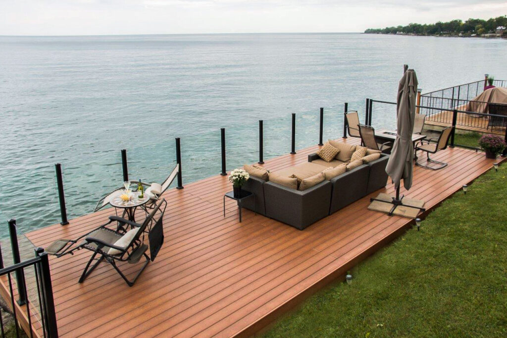 Glass railings on deck overlooking lake